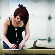 Woman measuring for auto repair